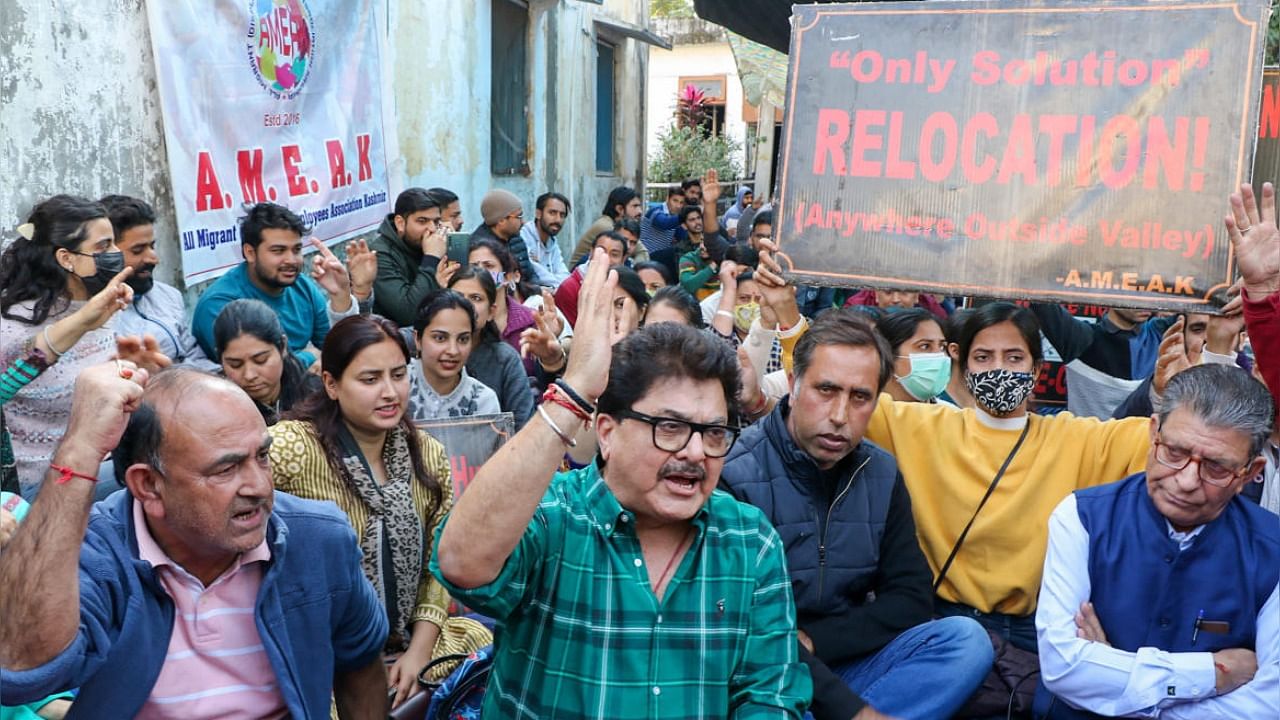 Film maker Ashoke Pandit alongside Kashmiri Pandits demand their relocation at a protest in Jammu. Credit: PTI File Photo