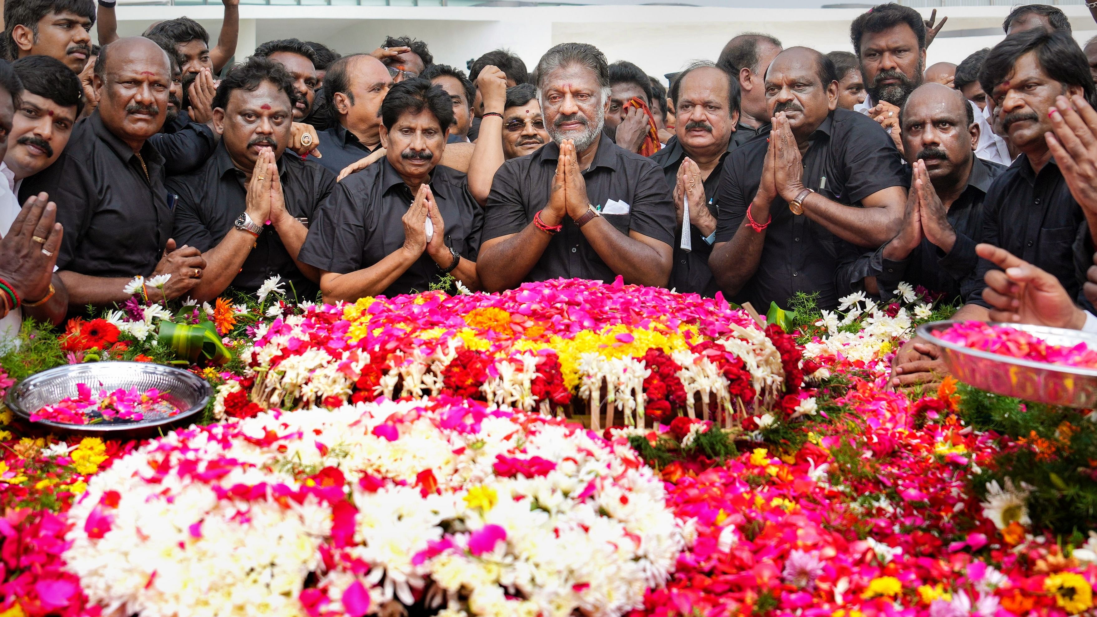 Former AIADMK coordinator O. Panneerselvam pays tribute to former Tamil Nadu chief minister J Jayalalithaa on her death anniversary, at her memorial in Chennai. Credit: PTI Photo
