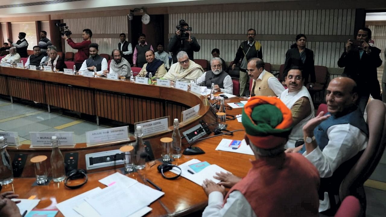 Defence Minister Rajnath Singh with Union Minister for Parliamentary Affairs Pralhad Joshi and other leaders during an all-party meeting ahead of the Winter Session of Parliament, at Parliament House in New Delhi. Credit: PTI Photo