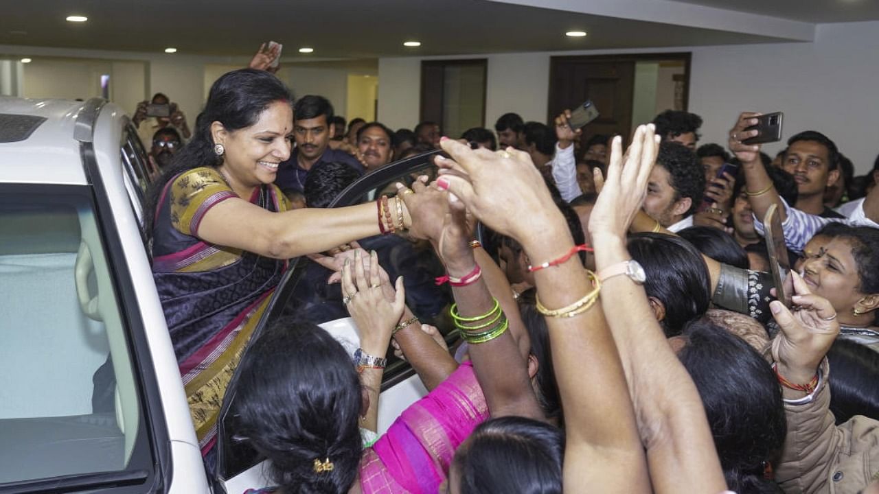 K Kavitha being greeted by party workers and supporters at her residence on Saturday. Credit: PTI Photo