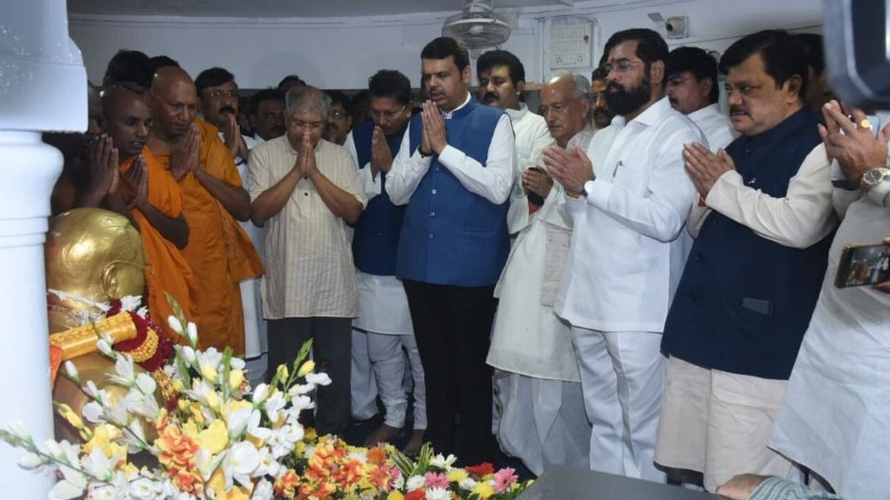 Governor Koshyari, CM Shinde and his deputy Fadnavis paid floral tributes to Ambedkar. Credit: Twitter/@mieknathshinde
