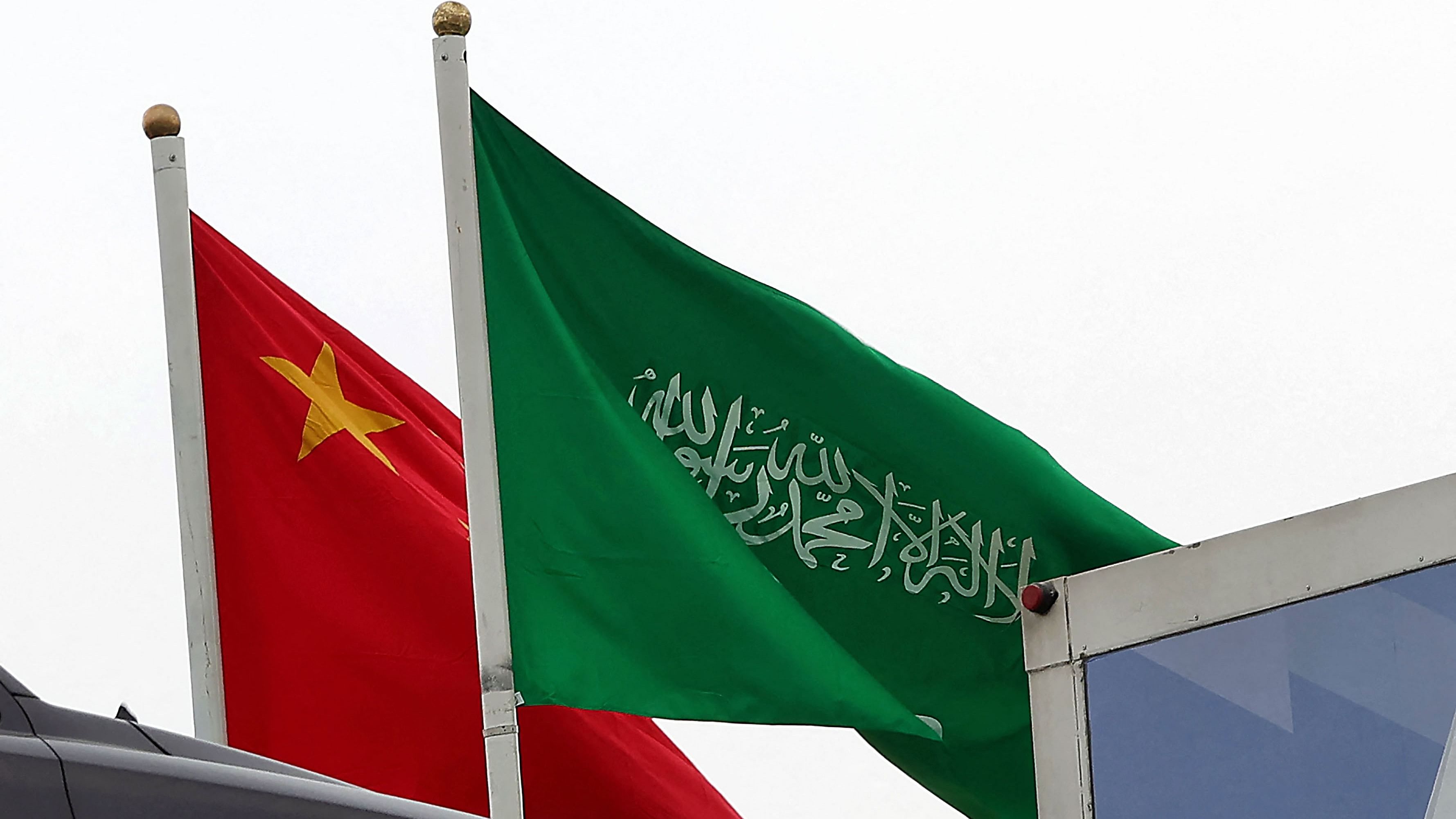 Saudi and Chinese flags flew on Wednesday in Riyadh, the Saudi capital, as he arrived, an honour flight flying over. Credit: AFP Photo 