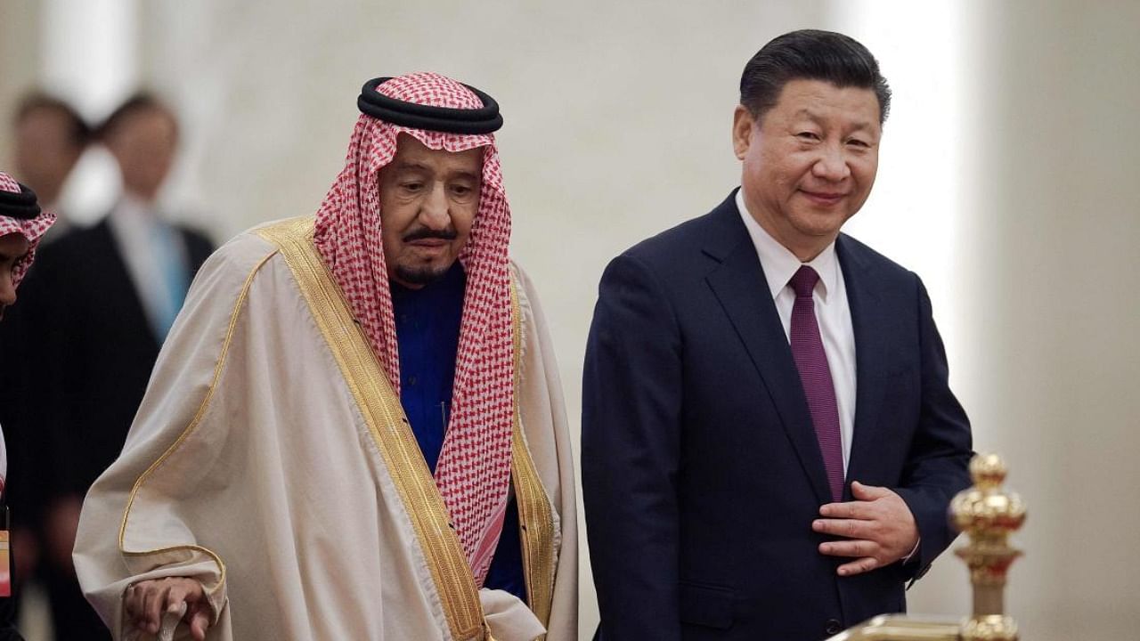 File photo of Saudi King Salman bin Abdulaziz (L) and Chinese President Xi Jinping (R). Credit: AFP 
