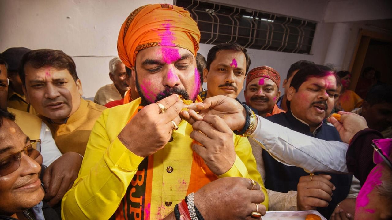 Leader of Opposition in Bihar Legislative Council Samrat Choudhary being offered sweets after BJP's victory in Kurhani Assembly constituency bypoll, in Patna. Credit: PTI Photo