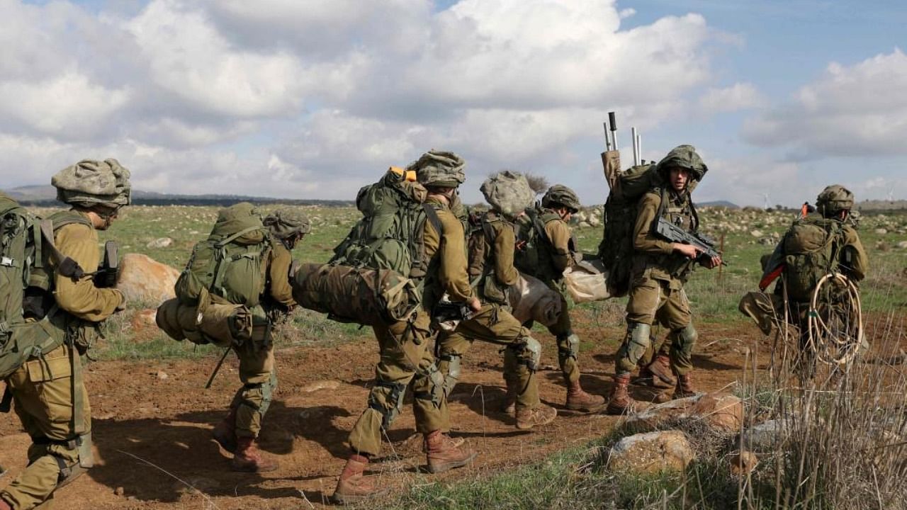 Israeli soldiers take part in a military exercise in Israeli-annexed Golan Heights. Credit: AFP Photo