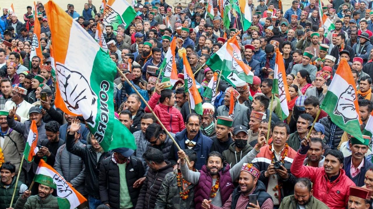 Congress workers celebrates the party's victory in Himachal Pradesh Assembly elections, in Kullu, Thursday, Dec. 8, 2022. Credit: PTI Photo