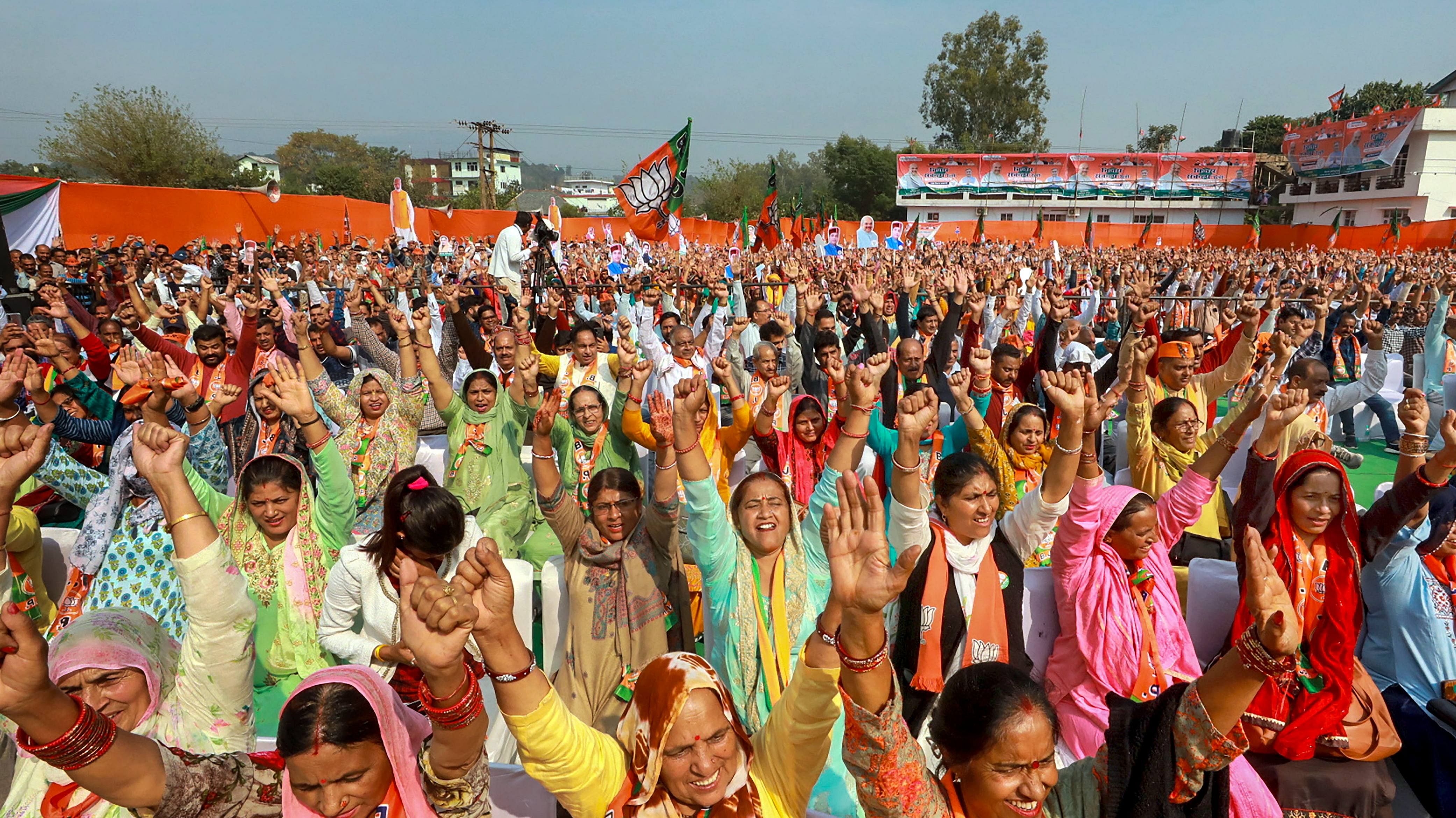  People attend a public meeting of Union Home Minister Amit Shah, ahead of the Himachal Pradesh Assembly elections, in Nadaun. Credit: PTI File Photo