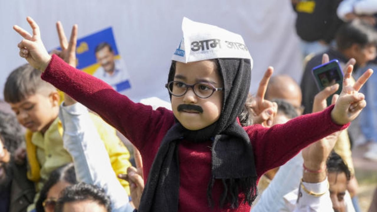 A child dressed as Delhi Chief Minister Arvind Kejriwal takes part in the celebrations of AAP's victory in the MCD polls. Credit: PTI Photo