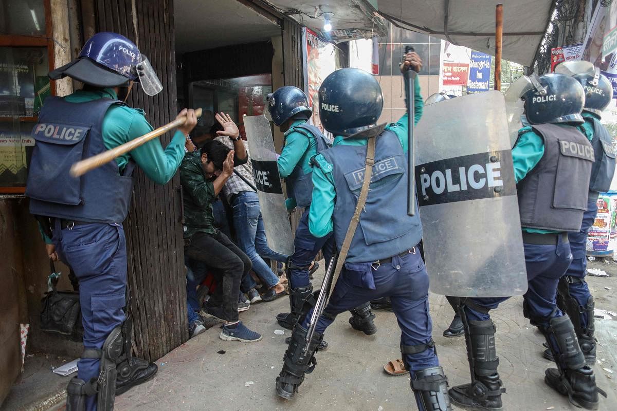 Police charge baton on Bangladesh Nationalist Party (BNP) activities as they gathered in front of the party's central office in Dhaka. Credit: AFP Photo