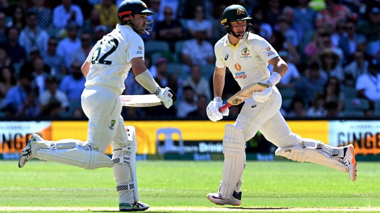 Australian batsmen Travis Head (L) and Marnus Labuschagne (R). Credit: AFP Photo