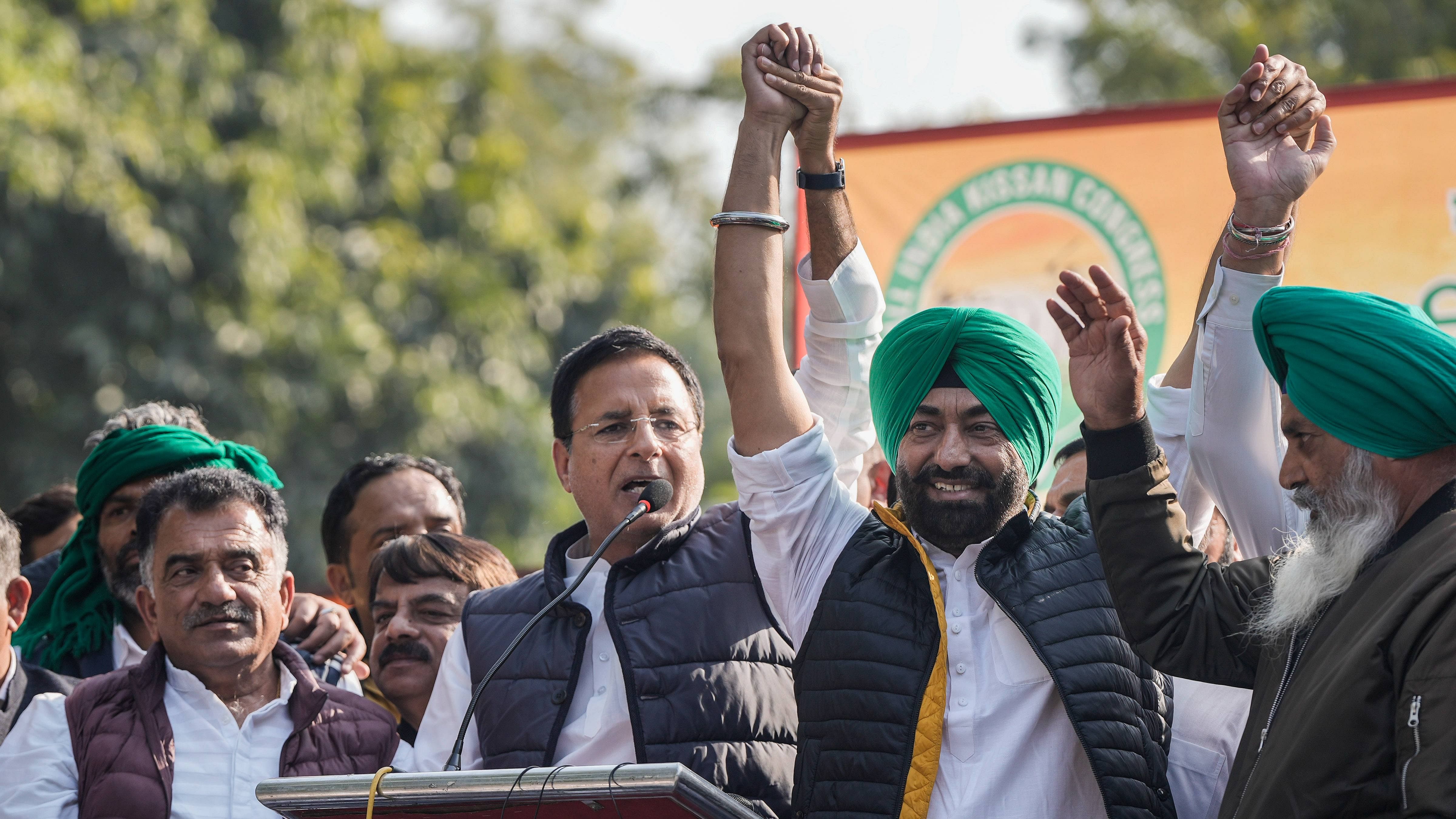 Chairman of All India Kisan Congress and MLA Sukhpal Singh Khaira with Congress leader Randeep Surjewala at a day-long protest over demand of the long-pending issues of farmers including making minimum support price (MSP) a legal right, at Jantar Mantar in New Delhi. Credit: PTI Photo
