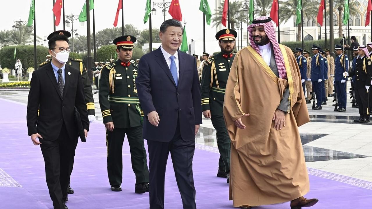 Chinese President Xi Jinping, who is paying a state visit to Saudi Arabia, attends a welcoming ceremony with Saudi Crown Prince and Prime Minister Mohammed bin Salmanat at the royal palace in Riyadh. Credit: AP/PTI Photo