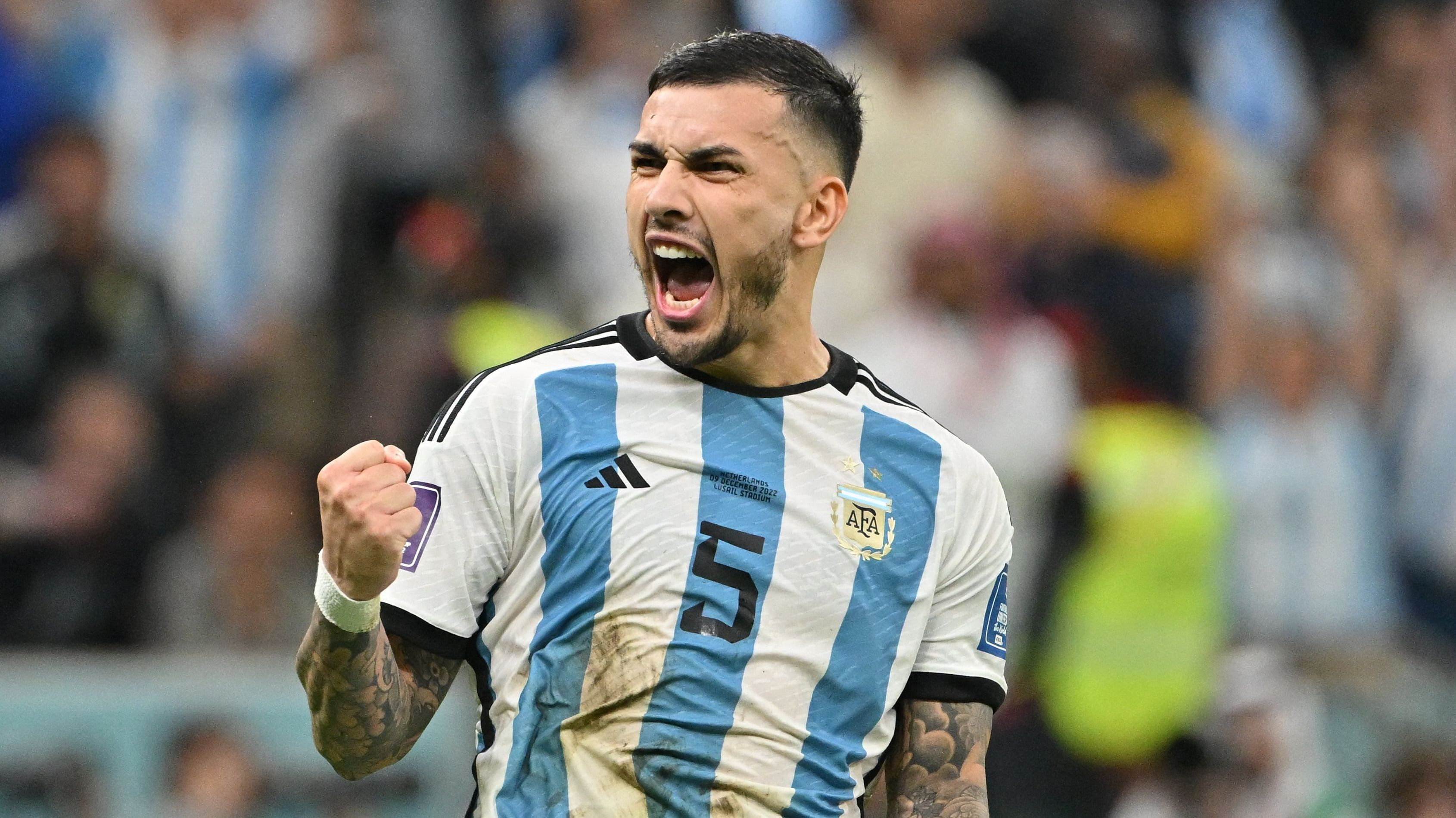 Argentina's midfielder #05 Leandro Paredes celebrates scoring during the shoot-out after extra-time. Credit: AFP Photo