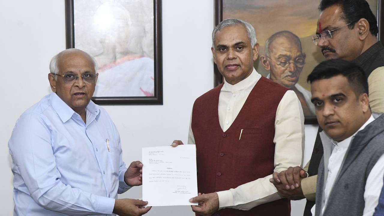 Bhupendra Patel meets Governor Acharya Devvrat to stake claim for the formation of government, at Raj Bhavan. Credit: PTI Photo