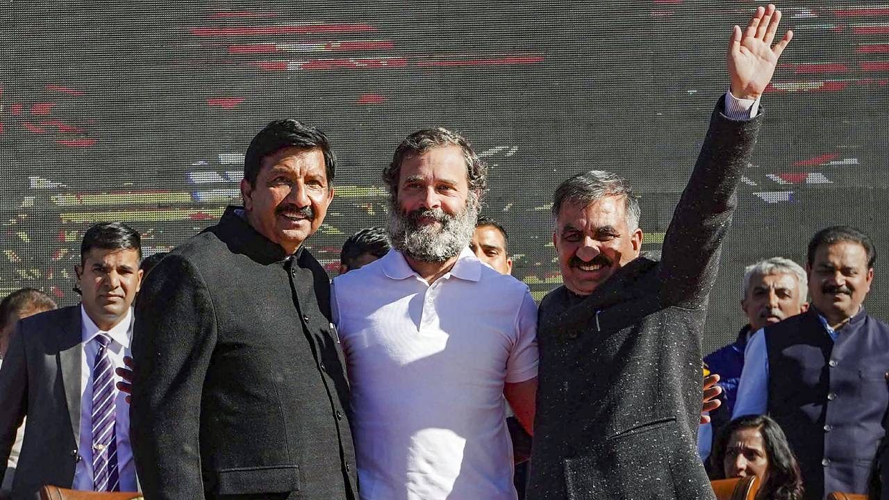 Sukhwinder Singh Sukhu and his deputy Mukesh Agnihotri with Congress leader Rahul Gandhi after the swearing-in ceremony, in Shimla. Credit: PTI Photo