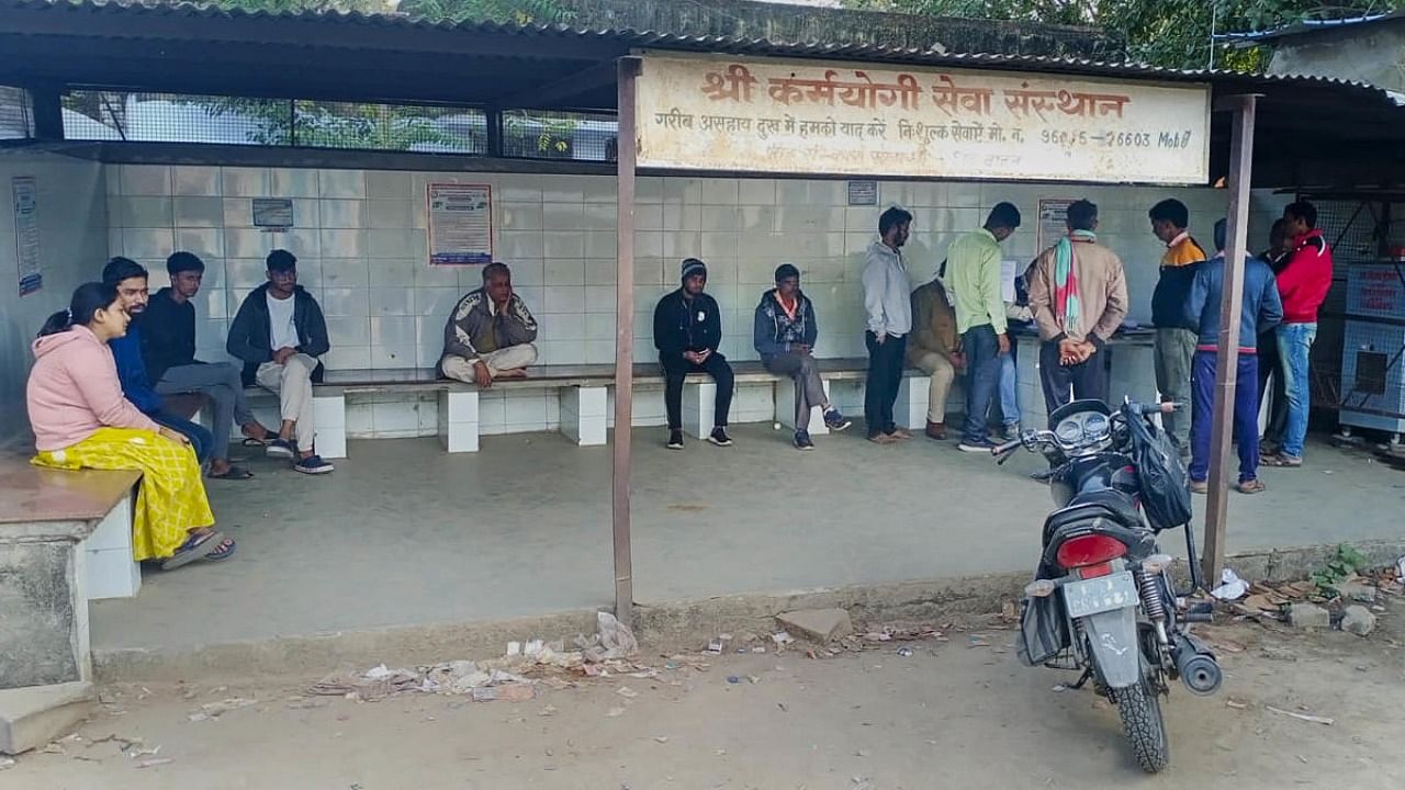 Family members and relatives of students, who were preparing for competitive exams, after they allegedly died by suicide, outside a mortuary, in Kota. Credit: PTI Photo