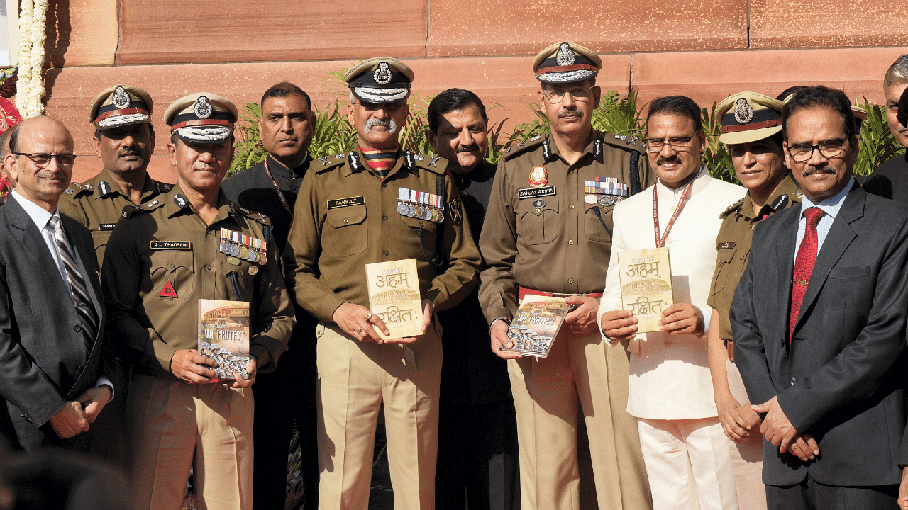  Director General of Central Reserve Police Force (CRPF), Sujoy Lal Thaosen , Delhi Police Commissioner Sanjay Arora , BSF DG Pankaj Kumar Singh during a tribute ceremony to pay homage to martyrs who lost their lives in the 2001 Parliament attack on its 21st anniversary, at Parliament House. Credit: PTI Photo