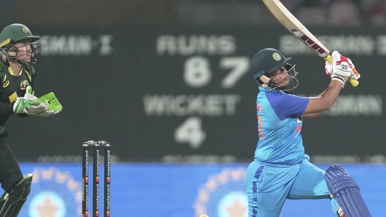 Indian player Richa Ghosh plays a shot during the T20 International series between India and Australia at Dr DY Patil Cricket Stadium, in Navi Mumbai. Credit: PTI Photo