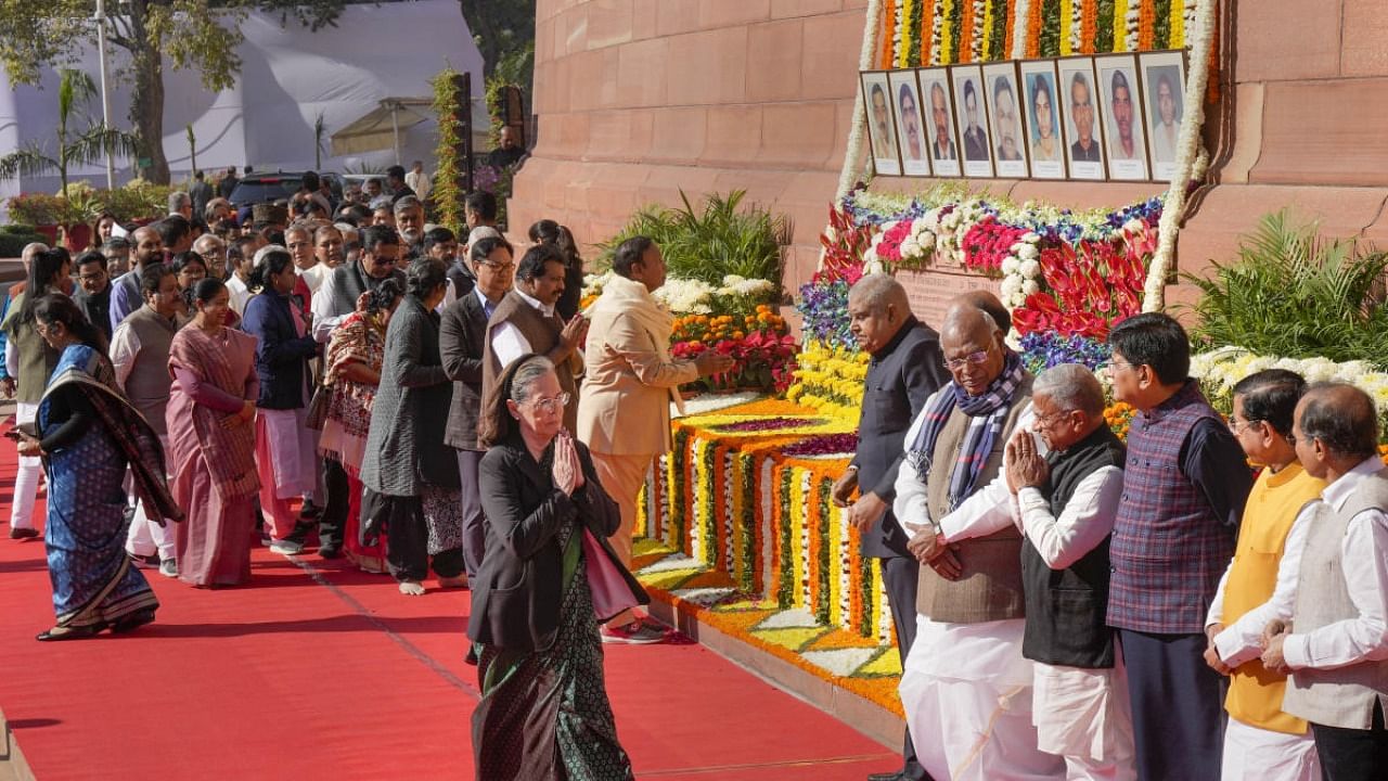 Congress MP Sonia Gandhi greets Deputy Chairman of Rajya Sabha Harivansh Narayan Singh after paying homage to martyrs who lost their lives in the 2001 Parliament attack on its 21st anniversary, at Parliament House complex in New Delhi, Tuesday, Dec. 13, 2022. Credit: PTI Photo