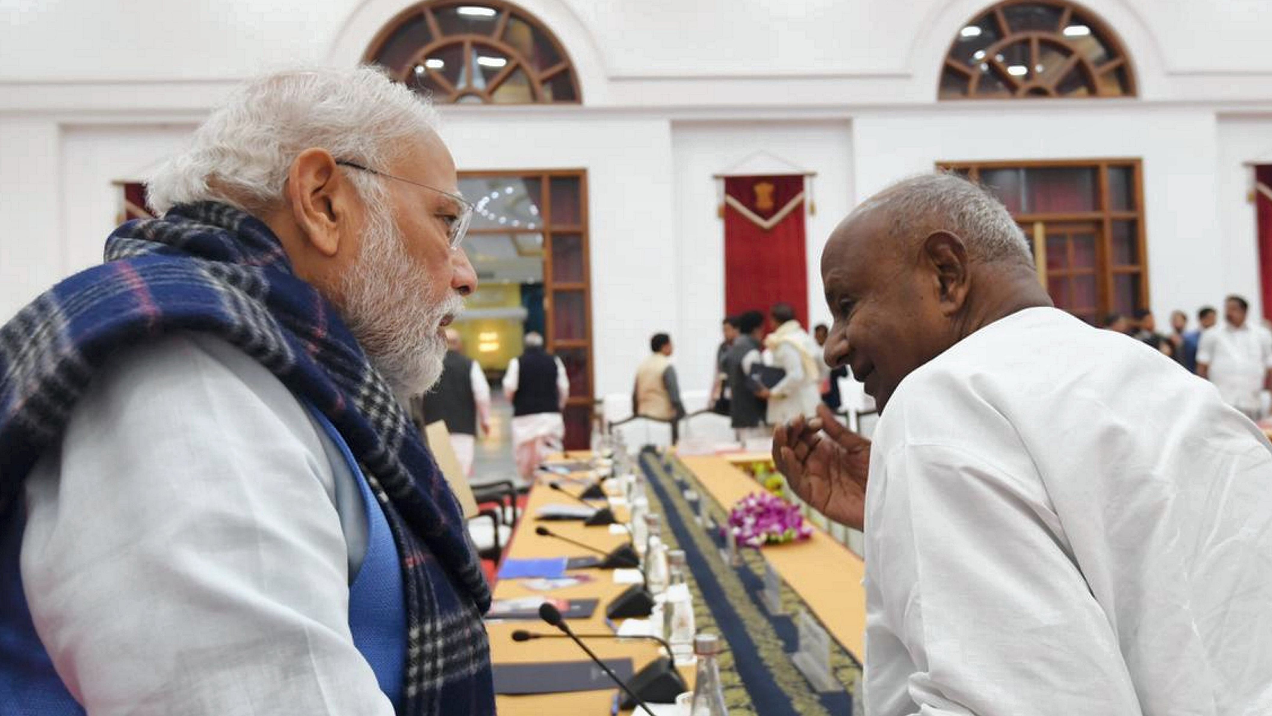 Prime Minister Narendra Modi with Former Prime Minister and JD(S) national president H.D. Deve Gowda. Credit: PTI File Photo