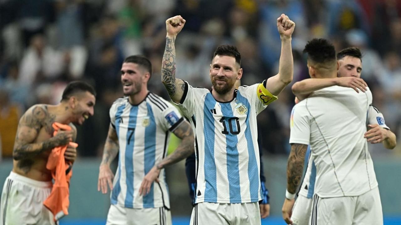 Lionel Messi celebrates after the match. Credit: AFP Photo