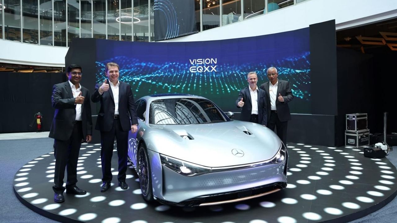 Manu Saale, Paul Dick and Jochen Feese with Mercedes-Benz Vision EQXX (left to right). Credit: Special Arrangement