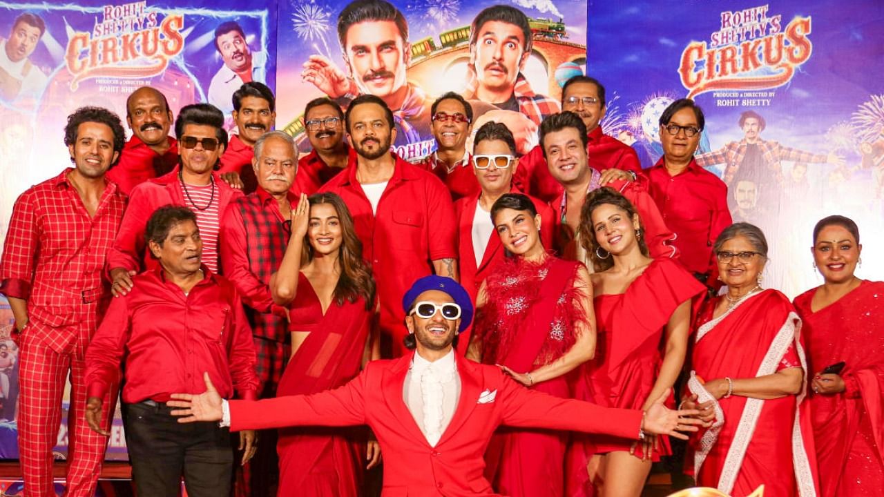 Director Rohit Shetty with actors Ranveer Singh, Pooja Hegde, Jacqueline Fernandez and others pose for photos during the trailer launch of 'Cirkus'. Credit: PTI Photo