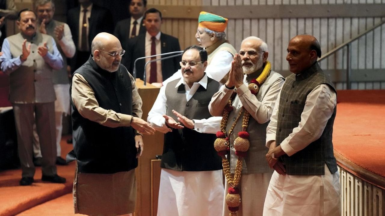 Prime Minister Narendra Modi felicitated during the BJP Parliamentary party meeting after the party's victory in Gujarat Assembly elections, in New Delhi, Wednesday, Dec. 14, 2022. Credit: PTI Photo
