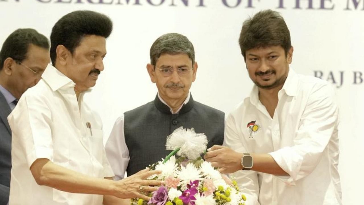 Tamil Nadu Governor RN Ravi with Chief Minister MK Stalin and his son and DMK MLA Udhayanidhi Stalin during the latter's swearing-in ceremony as Tamil Nadu Minister, at Raj Bhavan in Chennai, Wednesday, Dec. 14, 2022. Credit: PTI Photo