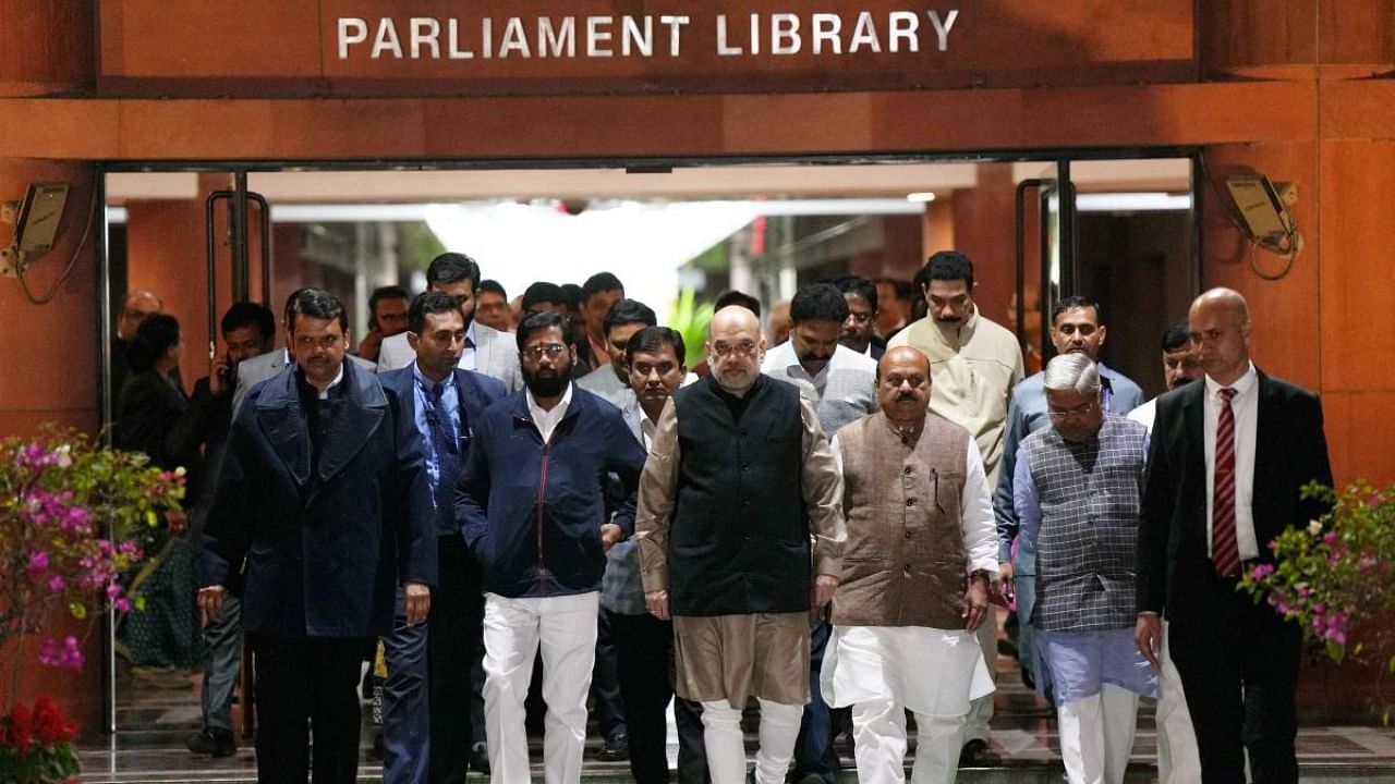 Union Home Minister Amit Shah with Karnataka Chief Minister Basavaraj Bommai, state Home Minister Araga Jnanendra, Maharashtra Chief Minister Eknath Shinde and the state Deputy Chief Minister Devendra Fadnavis after meeting over the state border dispute, at Parliament Library, in New Delhi. Credit: PTI Photo