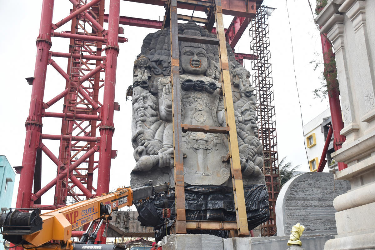 The installation work began on Sunday. The statue reached the temple in May 2019. Credit: DH Photo/B K Janardhan