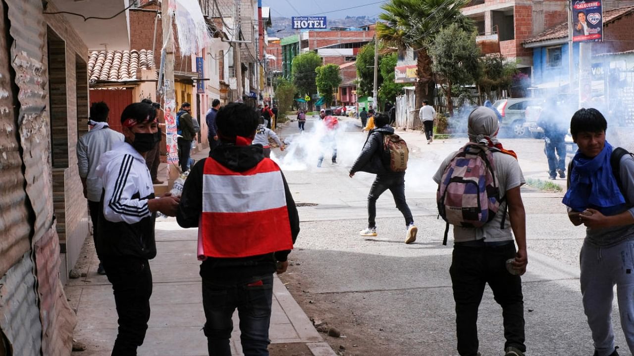 People demonstrate near the airport in Cuzco during a protest demanding the dissolution of the Congress and to hold democratic elections rather than recognizing Dina Boluarte as Peru's President, after the ouster of Peruvian leader Pedro Castillo. Credit: Reuters Photo