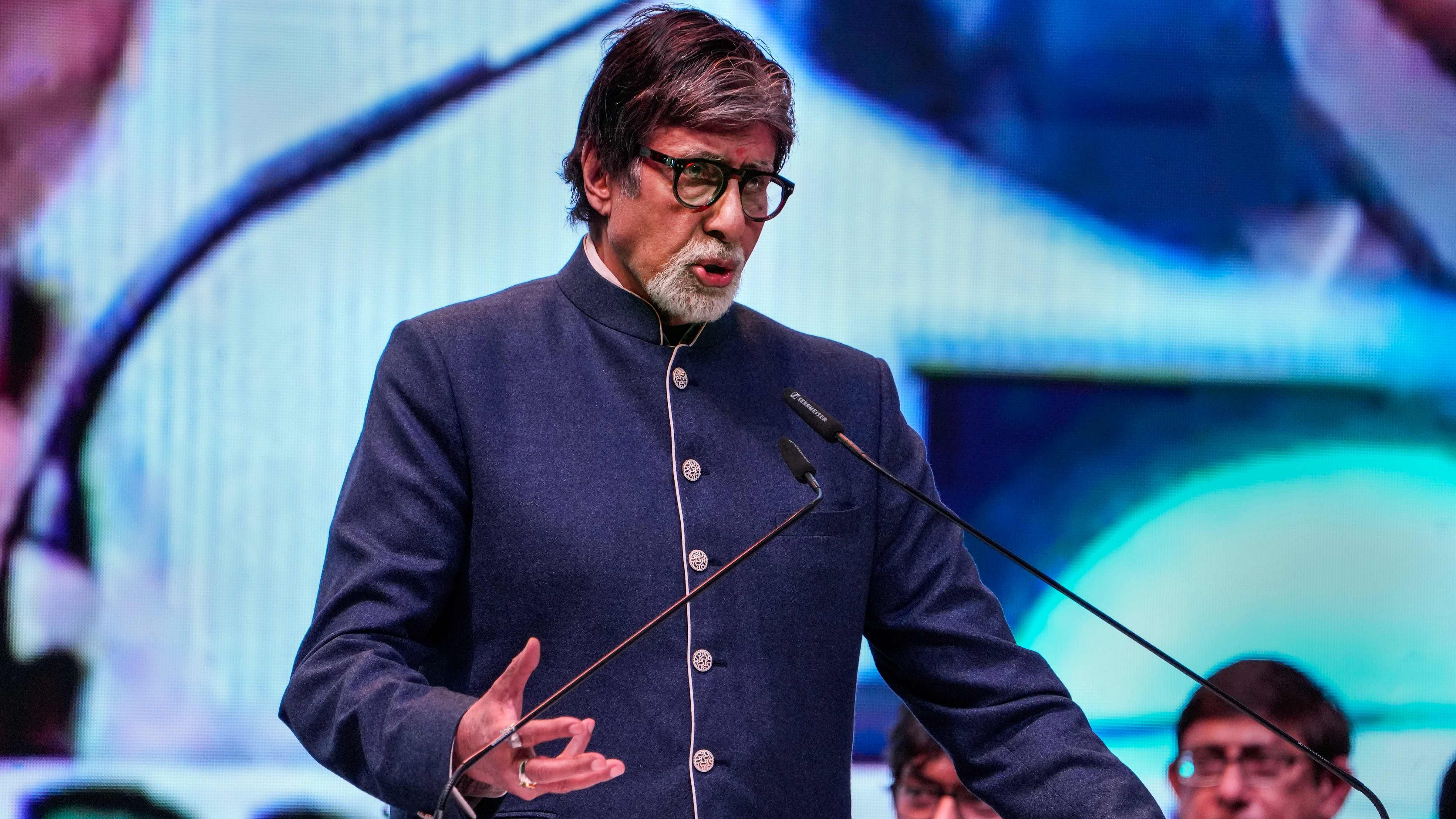 Amitabh Bachchan speaks during inauguration of the 28th Kolkata International Film Festival. Credit: PTI Photo