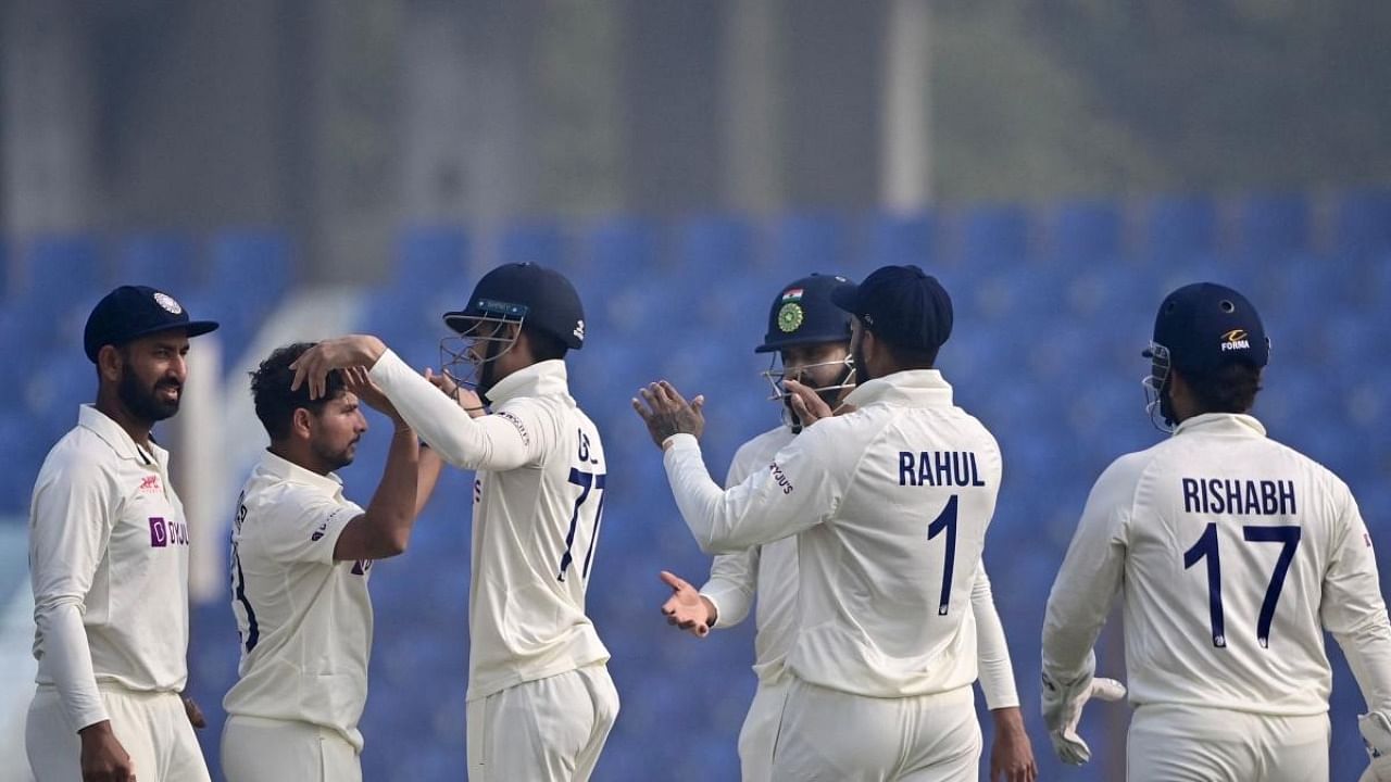 India’s cricketers celebrate after the dismissal of the Bangladesh’s Ebadot Hossain during the third day of the first cricket Test match between Bangladesh and India at the Zahur Ahmed Chowdhury Stadium in Chittagong on December 16, 2022. Credit: AFP Photo