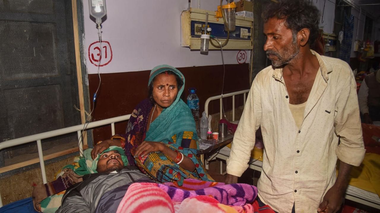 A victim of Saran hooch tragedy being treated in Patna Medical College and Hospital. Credit: PTI Photo