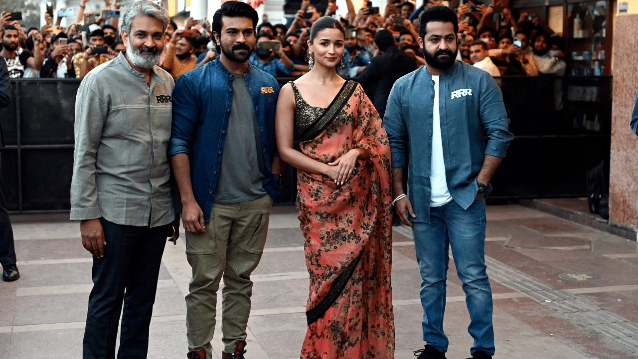 Indian actors NT Rama Rao Jr, Ram Charan, Alia Bhatt and director SS Rajamouli. Credit: AFP File Photo 