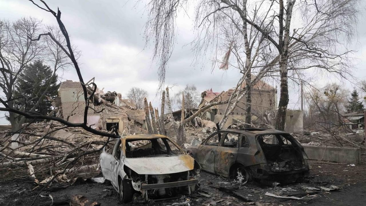 Gutted cars in the aftermath of an air raid in Ukraine. Representative Image. Credit: AP/PTI