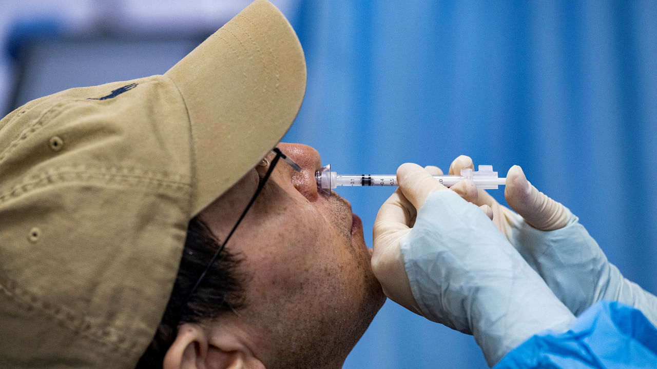 Disease modelers at the University of Hong Kong predict that lifting Covid restrictions and simultaneously reopening all provinces in December 2022 through January 2023 would result in 684 deaths per million people during that timeframe. Credit: Reuters Photo