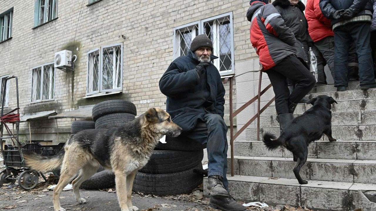 Local residents queue to receive humanitarian aid in Avdiivka, Donetsk region. Credit: AFP Photo