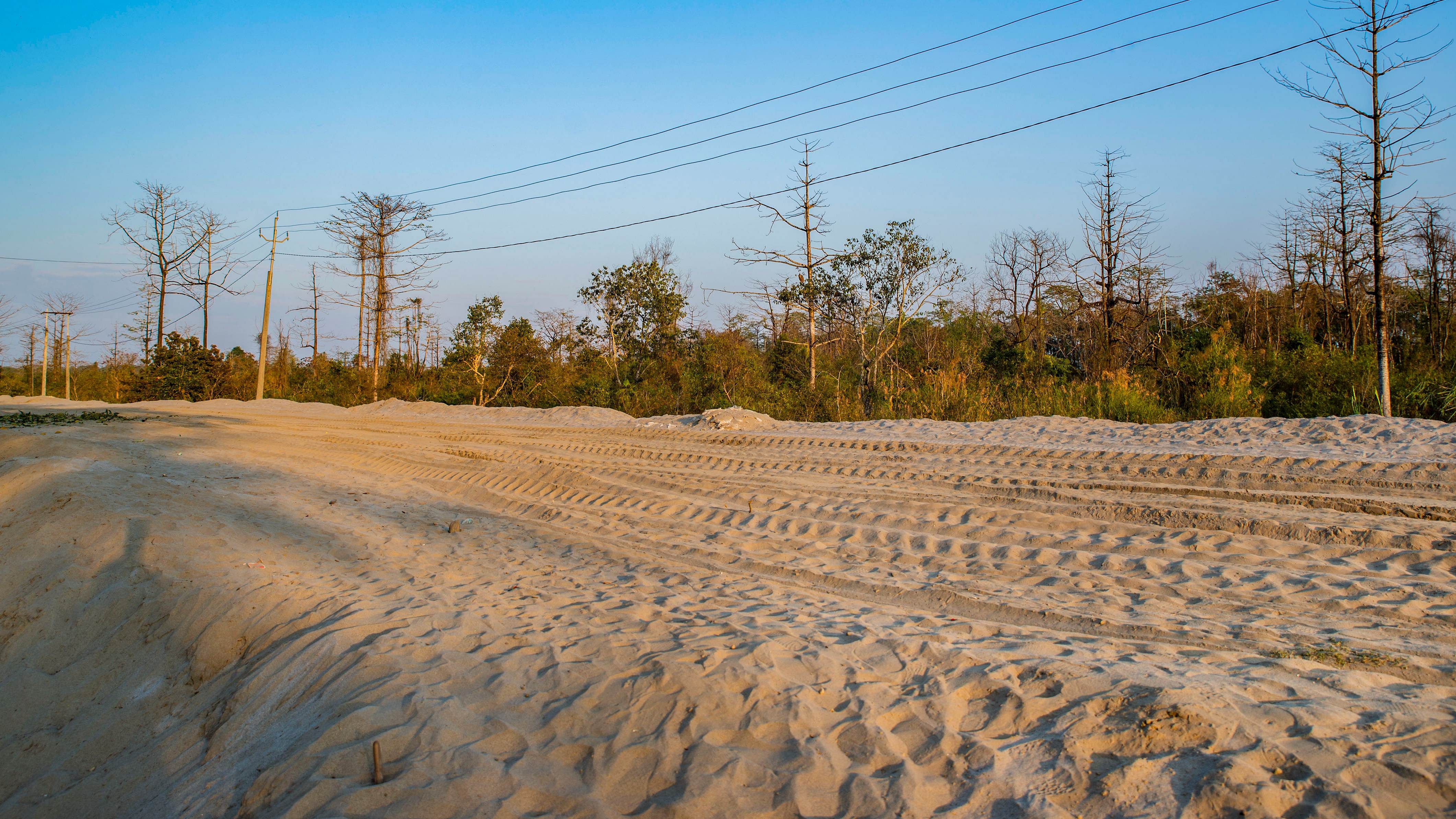 Sand deposition in the riverside villages, particularly in the paddy fields, is a long-term impact of flooding which increases with each rainfall in the catchment areas. Credit: PTI Photo