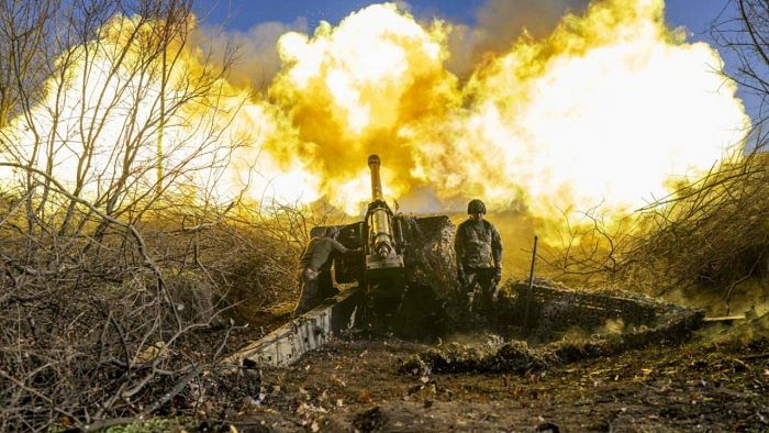 A Ukrainian soldier of an artillery unit fires towards Russian positions outside Bakhmut on November 8, 2022, amid the Russian invasion of Ukraine. Credit: AFP Photo