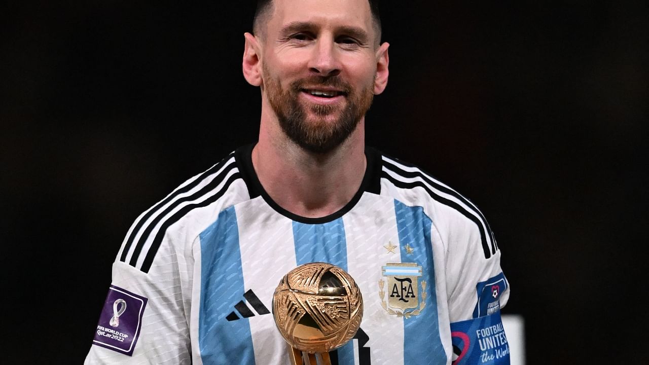 Lionel Messi with his Golden Ball award at the FIFA World Cup. Credit: AFP Photo