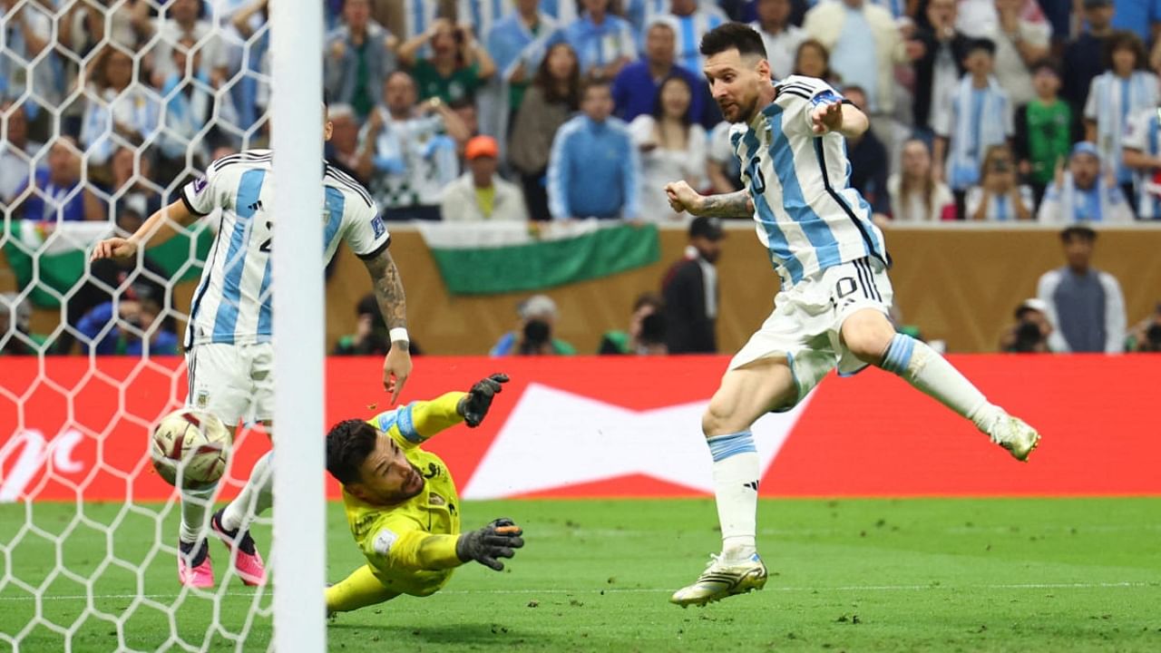 Argentina's Messi scores the team's third goal past France's Hugo Lloris. Credit: Reuters Photo