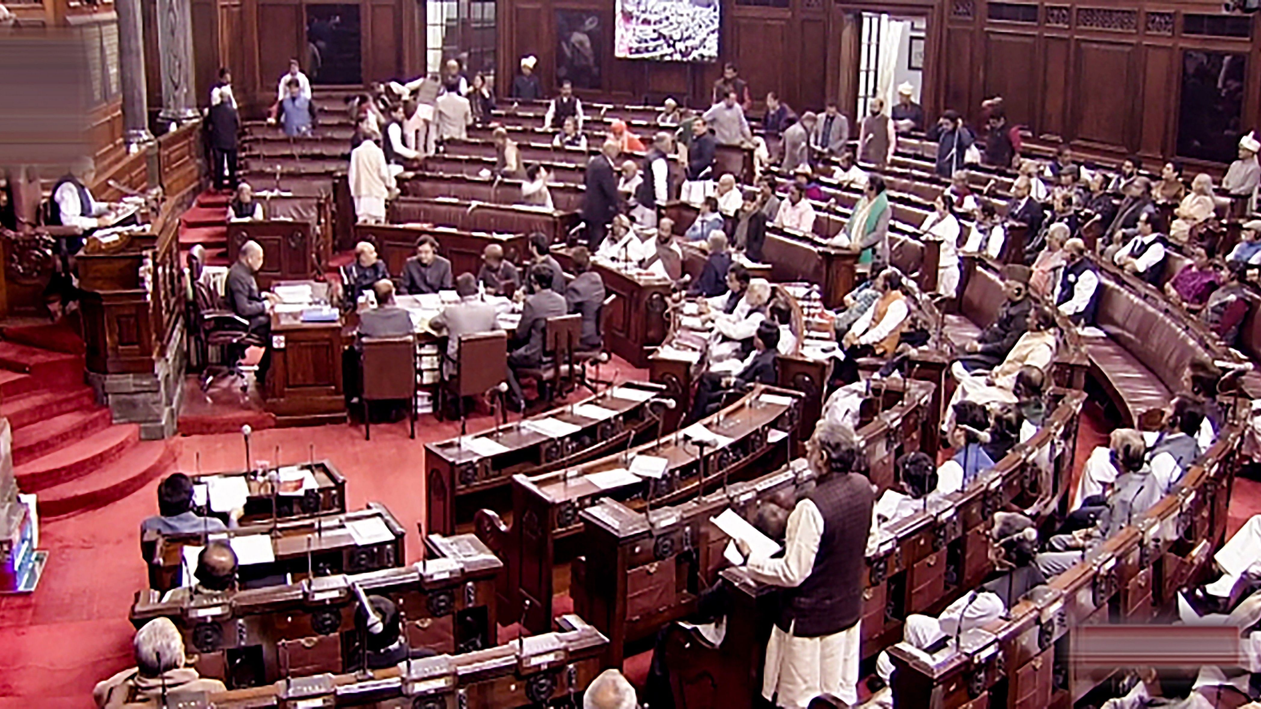 Opposition MPs walk out from the Rajya Sabha during the ongoing Winter Session of Parliament. Credit: PTI Photo