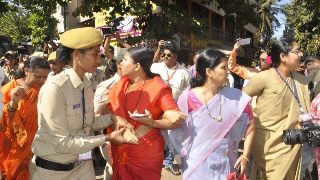 Police detain MES leaders, including former mayor Sarita Patil, Renu Killekar and others when they tried to enter the proposed Maha Melava venue in Belagavi. Credit: DH Photo