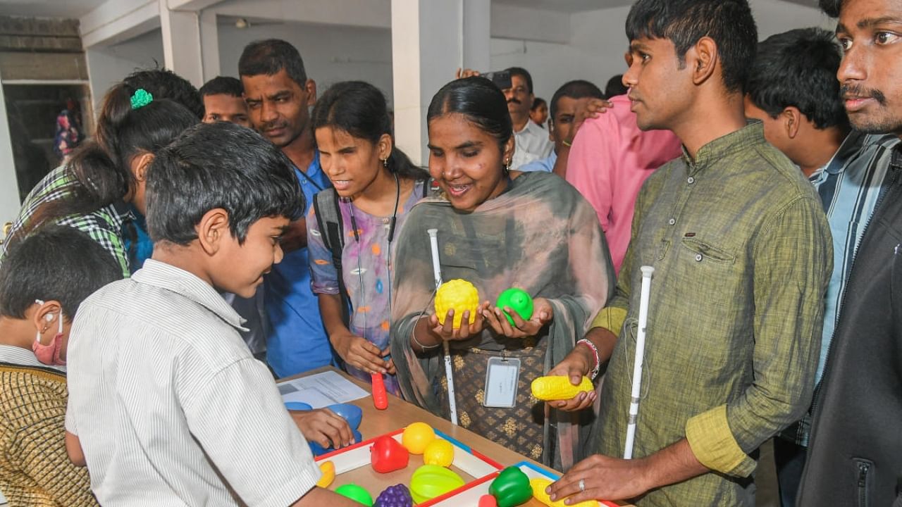 Participants at the ‘Curious Minds’ exhibition held in Bengaluru on Sunday. Credit: DH Photo/S K Dinesh