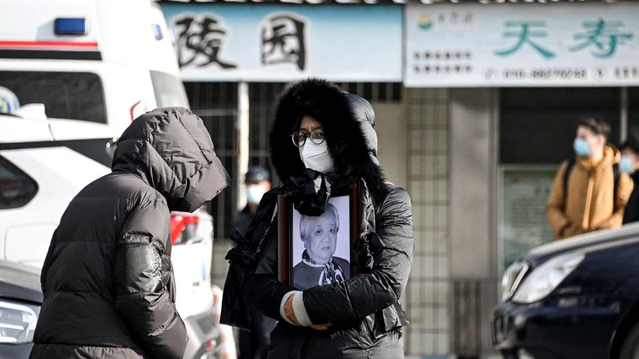 Workers at Beijing crematoriums said they are overwhelmed as China faces a surge in Covid cases that authorities warn could hit its underdeveloped rural hinterland during upcoming public holidays. Credit: AFP Photo