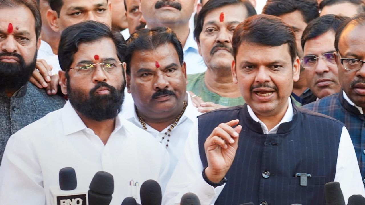 CM Eknath Shinde with Deputy CM Devendra Fadnavis on the 2nd day of the Winter Session of the state Assembly in Nagpur. Credit: PTI 