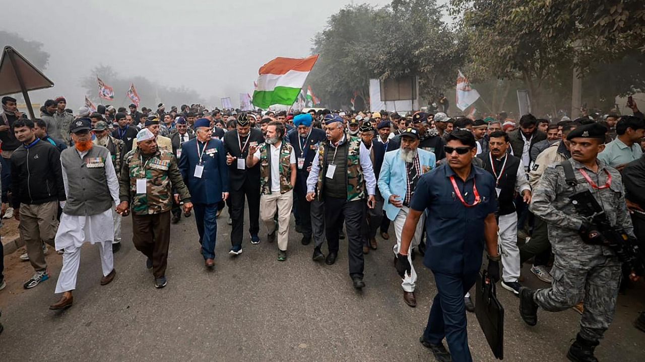 Congress leader Rahul Gandhi along with ex-servicemen walks during the party's 'Bharat Jodo Yatra', in Nuh district, Wednesday, Dec. 21, 2022. Credit: PTI Photo