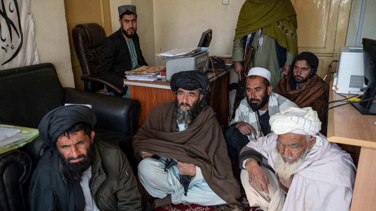Afghan petitioners gather in the civil court office at the Ghazni Court of Appeal in Ghazni, eastern Afghanistan. Credit: AFP Photo